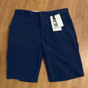 Dockers men’s navy blue shorts. New with tags, classic fit. Size 33